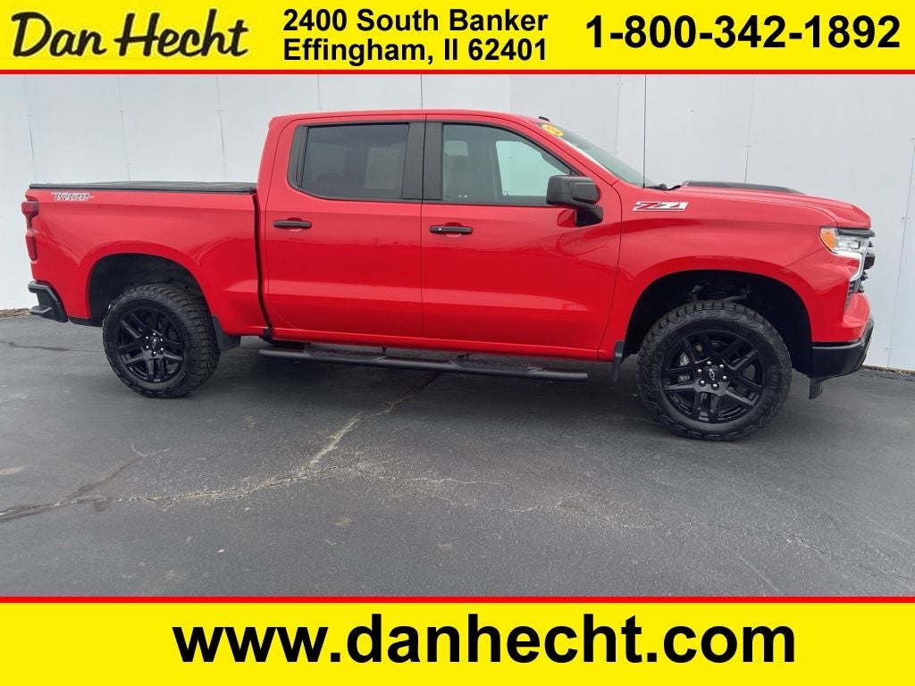 2023 Chevrolet Silverado 1500 LT Trail Boss in Red Hot — front three-quarter view