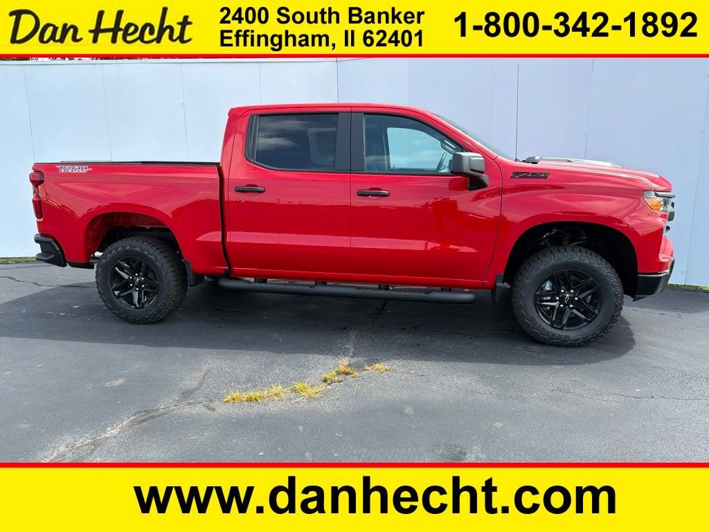 2026 Chevrolet Silverado 1500 Custom Trail Boss in Red Hot — front three-quarter view